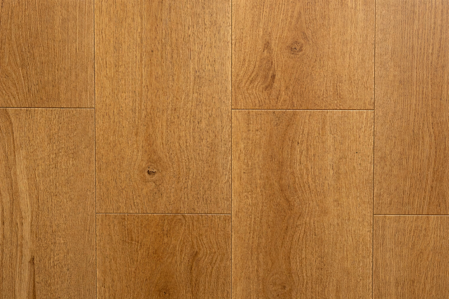 Golden oak luxury vinyl tile (LVT) flooring sample with realistic wood grain finish